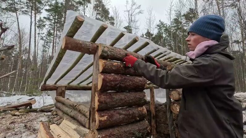 Winter bushcraft shelter build — survival shelter construction in snow