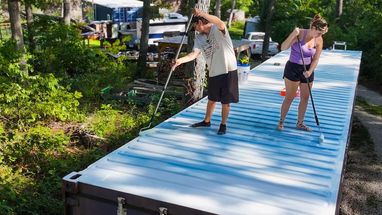 Off-grid shipping container workshop with insulation and temperature control systems