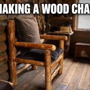 Builder assembling a custom wooden log chair inside an off-grid log cabin using hand tools